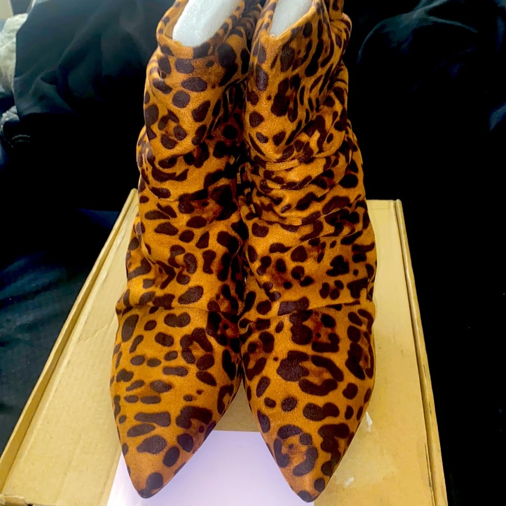 Journee Colllection kitten heel Leopard print booties. Never been worn.